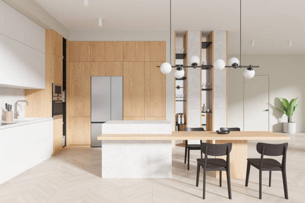 istock Stylish home kitchen interior with cooking and dining table with chairs 2072853799