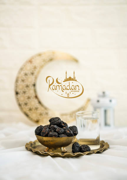 istock Iftar background Dates in a golden bowl 2072858996