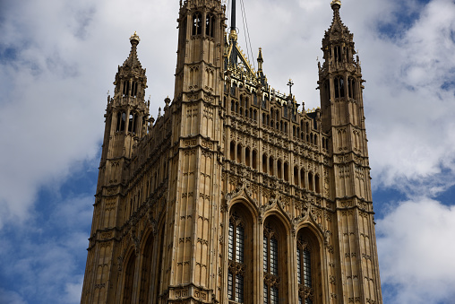 The Victoria Tower is a square tower at the south-west end of the Palace of Westminster in London.  It was designed by Charles Barry in the Perpendicular Gothic style and was completed in 1860. The image shows the tower captured during summer season.
