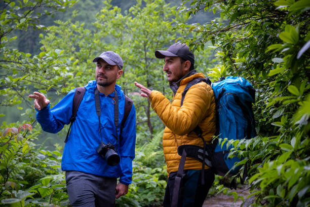 istock Two traveling friends going for a walk in the forest 2072871160