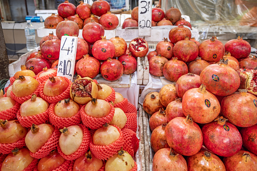Chow Kit market, Kuala Lumpur, Malaysia - January 8th 2024:   A pile of Pomegranates, Punica granatum at the central market in Kuala Lumpur