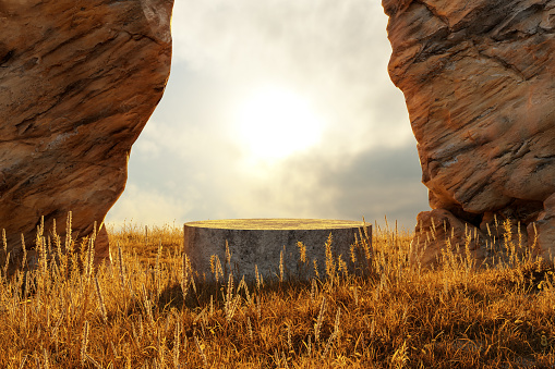 Abstact 3d render summer scene and Natural background,  Stone podium on dry grass fielld with big rocks and cliffs in sunset for product stand display, mockup, advertising or etc