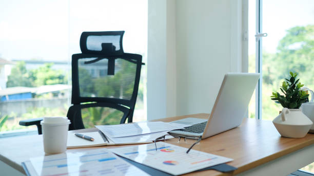 istock Engineer technician workplace with laptop, mechanical parts, blueprints and measuring tools on table. 2072914653