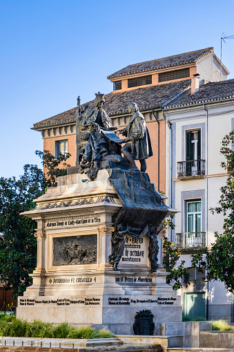 Monument to Isabella the Catholic in the old town of Granada, a bronze sculptural group depicting a meeting of Isabella I with Christopher Columbus, a work by Mariano Benlliure dating 1892