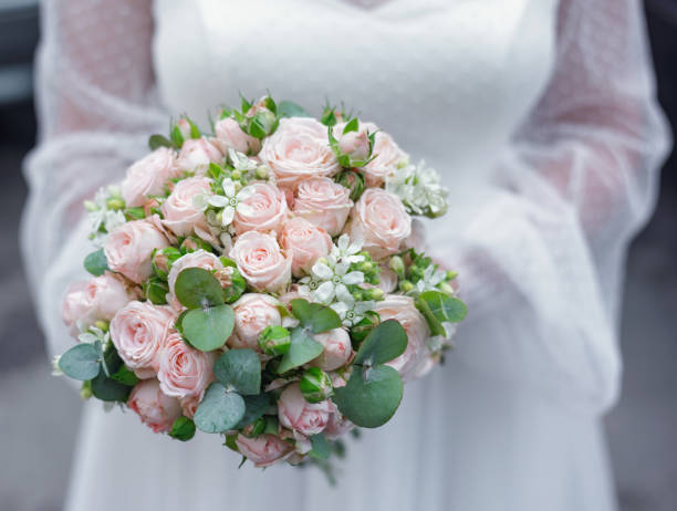Free Stock Photo of Woman in Wedding Dress Holding Bouquet of Flowers ...
