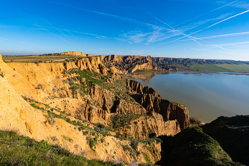 gorges and canyons precipice next to lake. arid land. Barrancas de Burujón, Toledo Spain