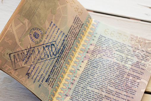 Passport revoked by the state police. Concept of compliance with state laws. Horizontal view.