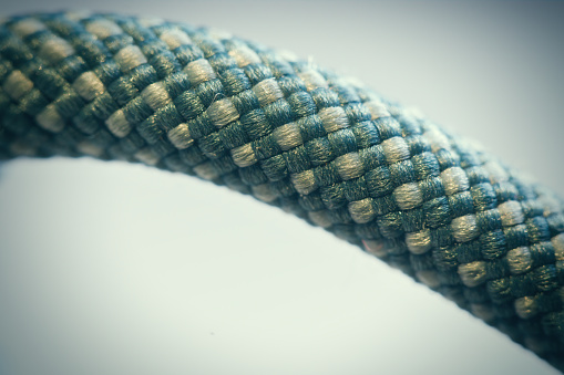 Macro detail picture of an knitted rope of synthetic fibers