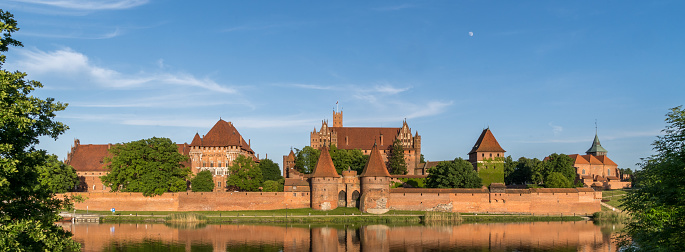 Malbork, Poland - May 31st, 2023: A view of the unparalleled Castle of the Teutonic Order in Malbork from the 13th century, being the world's largest castle by land area.