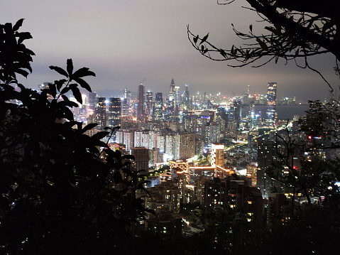 Shenzhen skyline at night, viewed from Nanshan mountain, a mountain range in Shenzhen, located at the southern tip of Nanshan District, itself named after the mountains. Guangdong province, China