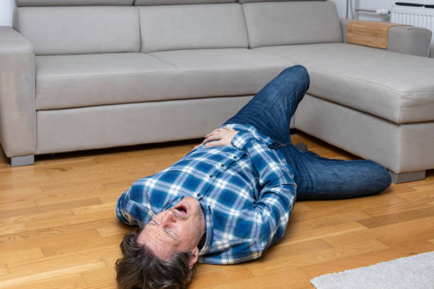 istock Men after fall on a floor and touching his hip 2073086390