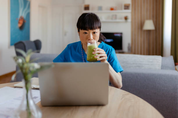 istock Asian Female Healthcare Worker Working Remotely 2073118124