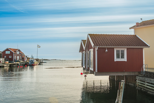 Smogen in Bohuslan, Sweden. A rescue boat is moored by the jetty