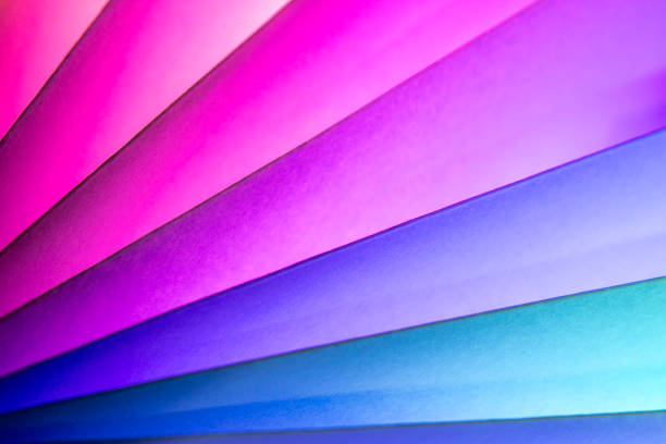 When I roll paper into many circles, I create a background with a sheet of paper and lights made up of different colors.