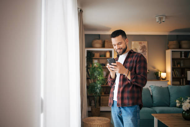 istock An adult man is using his smartphone. 2073197253