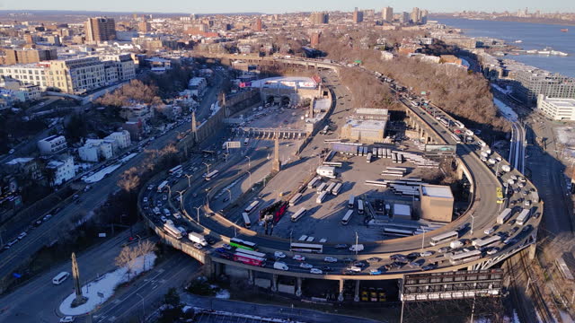 Rush traffic on Lincoln Tunnel exit in Weehawken, New Jersey during commute hours in the afternoon. Aerial footage with static camera motion