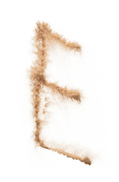 istock E English alphabet made of Sand explosion with E English alphabet scattered, space for text. Concept of Flying sand particle object to shape in air. White background Isolated throwing element object 2073263304