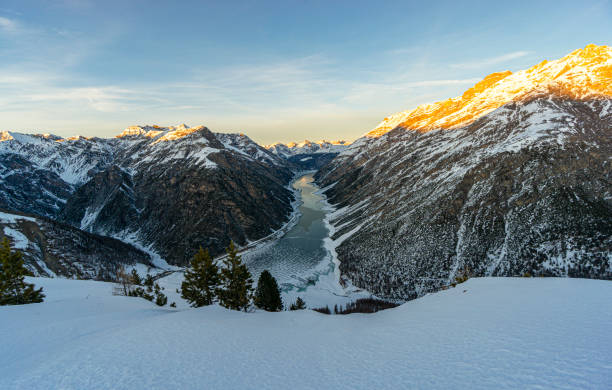 the splendid Livigno seen from above at sunset.  lights and snow make everything magical!