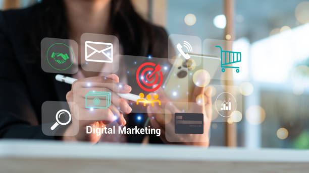 istock Digital marketingmedia (website ad,email, socialnetwork, SEO, video,mobile app) invirtual globe shapediagram.Waves ofblue light andbusinessman usingon smartphone asconcept 2073279125