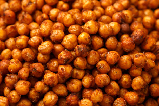 istock Roasted spicy chickpeas in bowl. Healthy snack. 2073336937