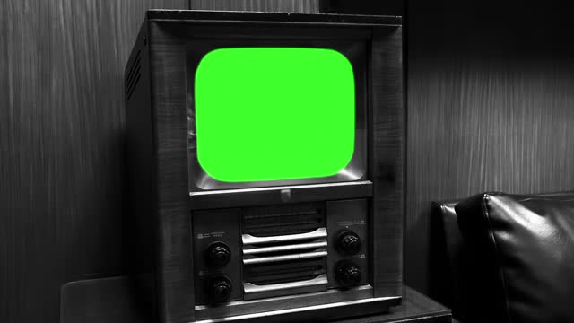 Old Wooden TV Green Screen. Televisions Used to Be Made of Wood in Days when Electronics were Described as Furniture-style. Black and White Tone. 4K Resolution.