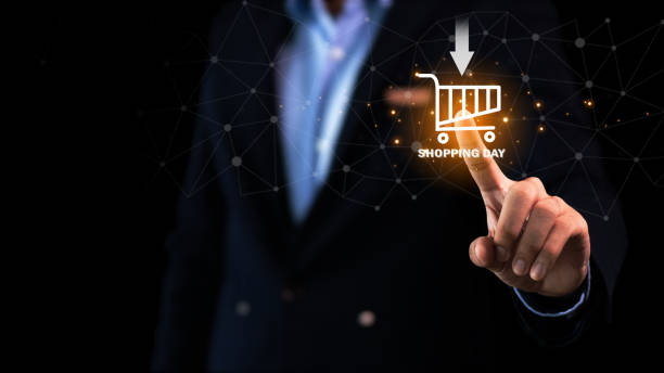 istock Digital marketing media (website ad, email, social network, SEO, video, mobile app) in virtual globe shape diagram. businessman using on smartphone and  laptop with shopping cart icon as concept, Online shopping and e-commerce concept. 2073417659