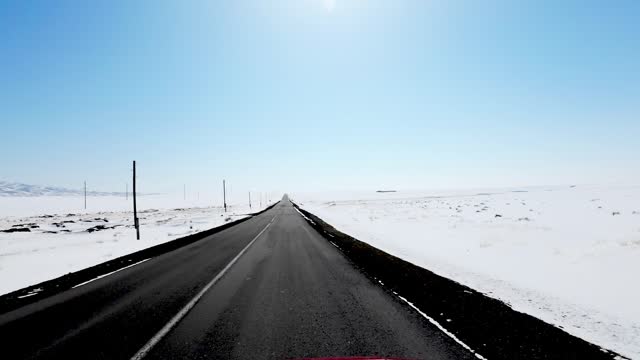 Road in winter steppe