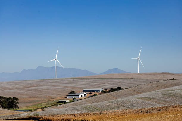 Wind turbines generating renewable green energy in South Africa stock photo