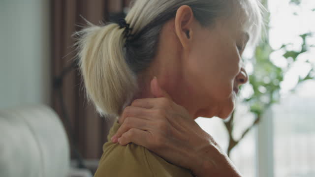 Stress and Neck Pain on senior woman