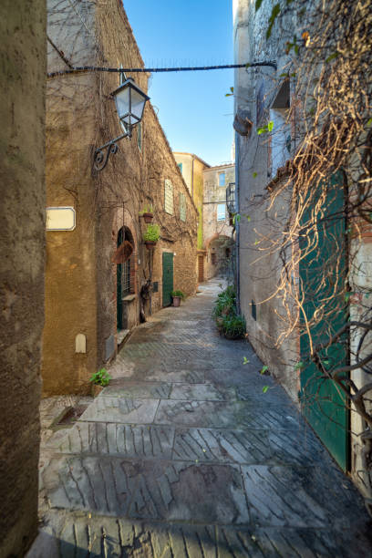 Narrow alley in a medieval village in Grosseto Province