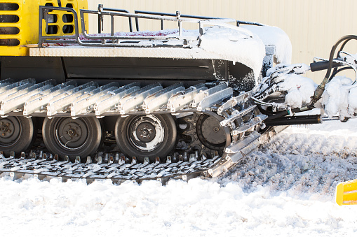 Tractor Snowmobile on tracks. Cross-country vehicles.