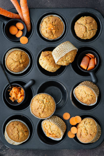 food, muffins, carrot, sweet food, freshly baked carrot muffins on a baking tray