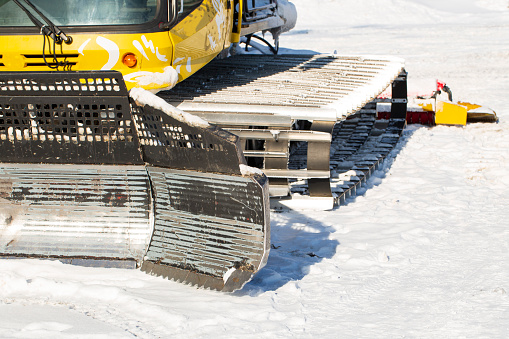 Tractor Snowmobile on tracks. Cross-country vehicles.