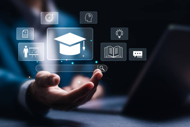 istock Businessman use computer laptop with Online education training icons and e-learning webinar on internet. Increase business working skills. Education internet technology. Online education concept. 2073541820