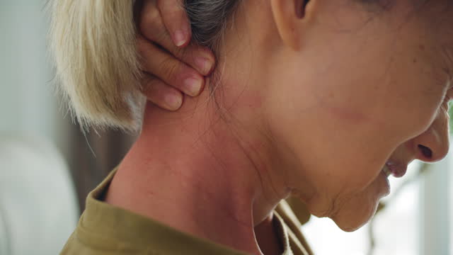 Stress and Neck Pain on senior woman