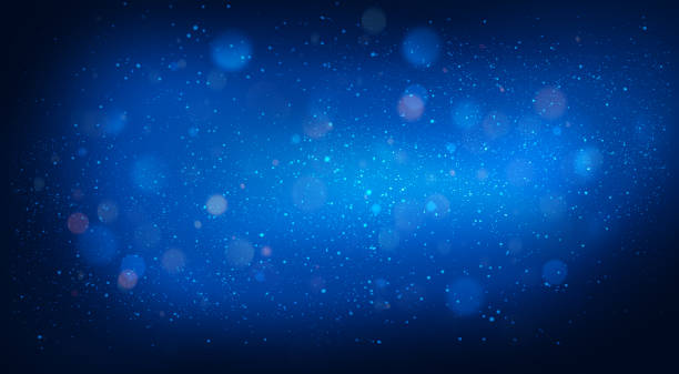 istock dark blue background with flying particles and small specks of dust 2073562341
