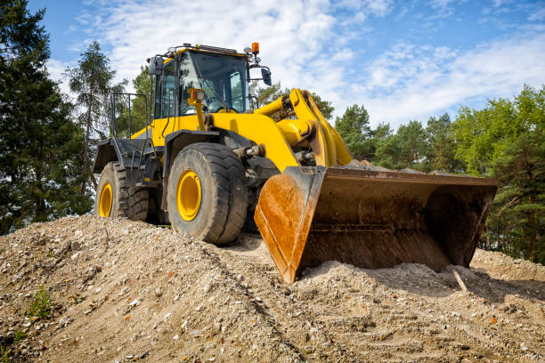 istock Road construction machinery on the construction of highway 2073633027