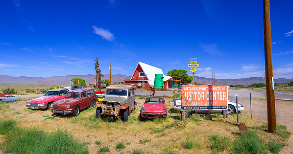 Antares,  Arizona, United States - September 22, 2023: Antares Point along Historic Route 66, Arizona,  with vintage parked cars and Giganticus Headicus, a famous roadside attraction