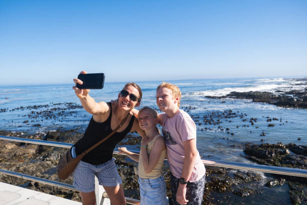 istock Fun family selfie on our beach holiday 2073744377