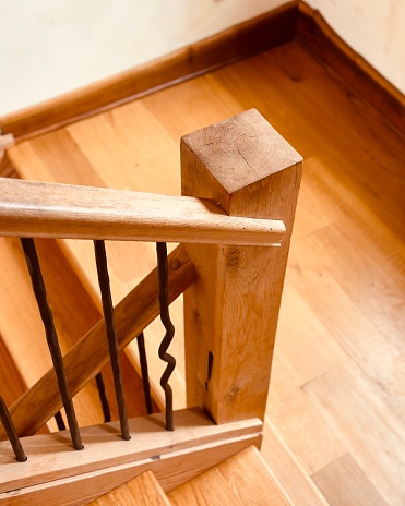 Ornate wooden staircase and bannister