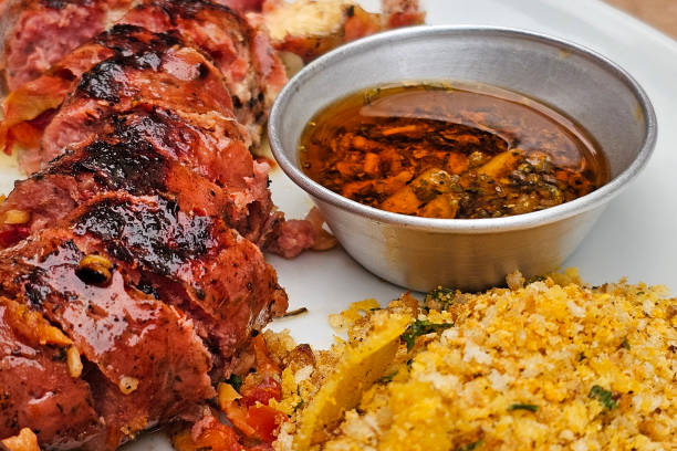 Sausage served with farofa and chimichurri sauce