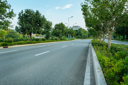 Background image of car advertisements on urban landscape roads