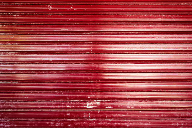 Structure of red iron gates. Close-up. High quality photo
