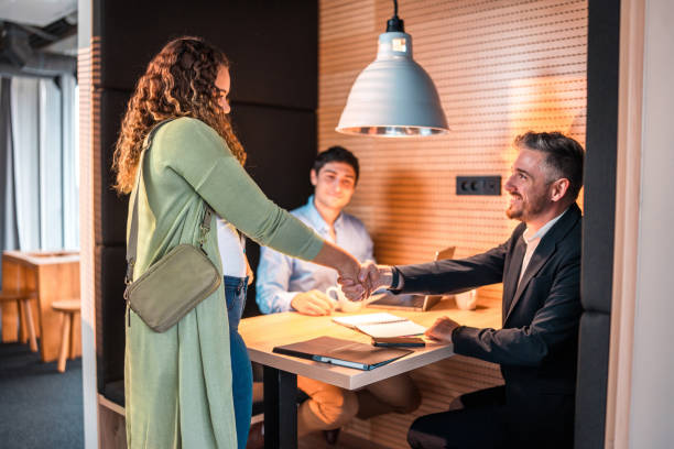 istock Diverse Business People Handshake in Modern Office 2073859349