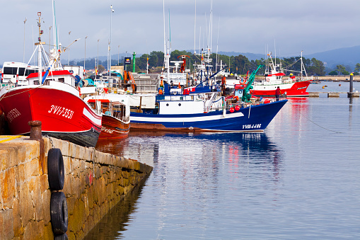 Fishing boats mooring, fishing harbor, stone ramp, O Grove, Rías Baixas, Pontevedra province,Galicia, Spain.