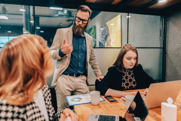 istock Business people working late in the office 2073923135
