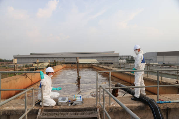 istock Biologists and wastewater treatment experts Conduct water quality simulation experiments. at the wastewater treatment plant 2073930549