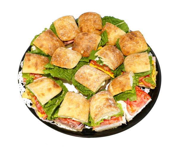 istock close up on fresh sandwich in the platter isolated on white background 2073968567