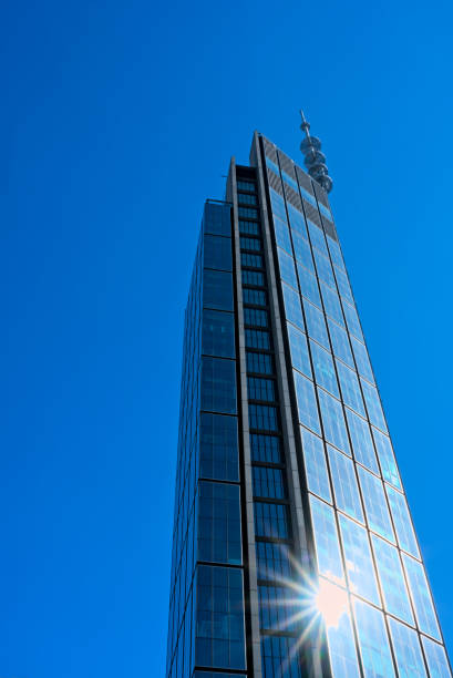varso tower skyscrapper with sun reflection vertical shot of the tower from below wide angle shot 2
