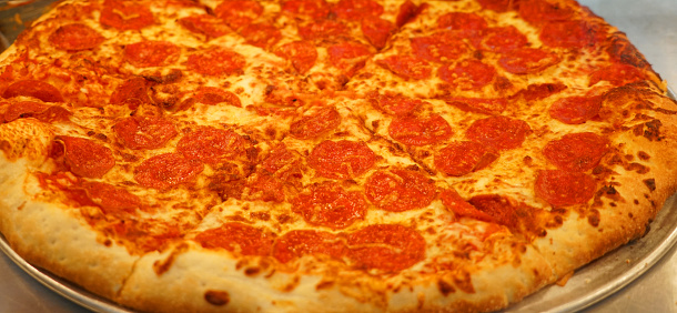 close up on fresh baked pepperoni pizza